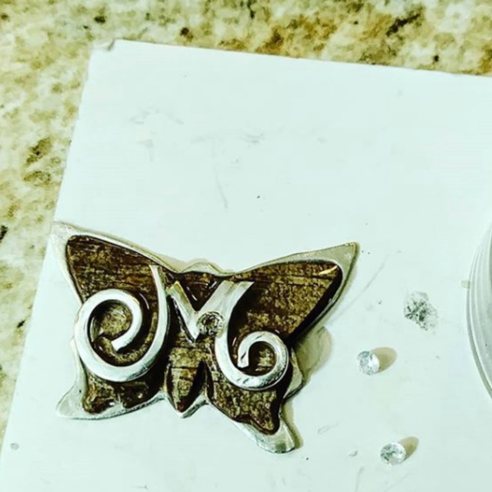 Butterly necklace with your initial.